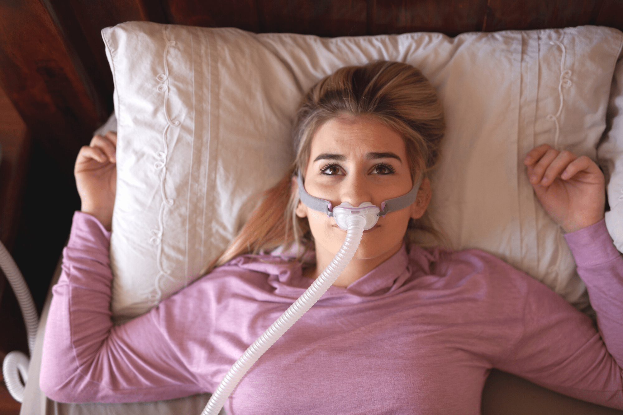 Man suffering from sleep apnea unable to sleep with CPAP mask
